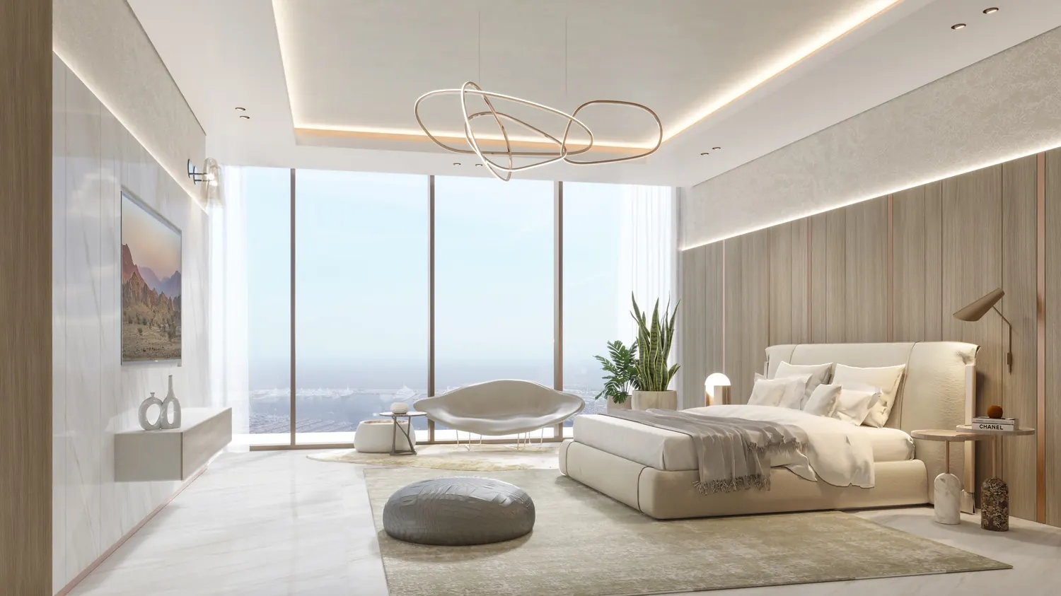 Bedroom with full height glazing framing the coastline