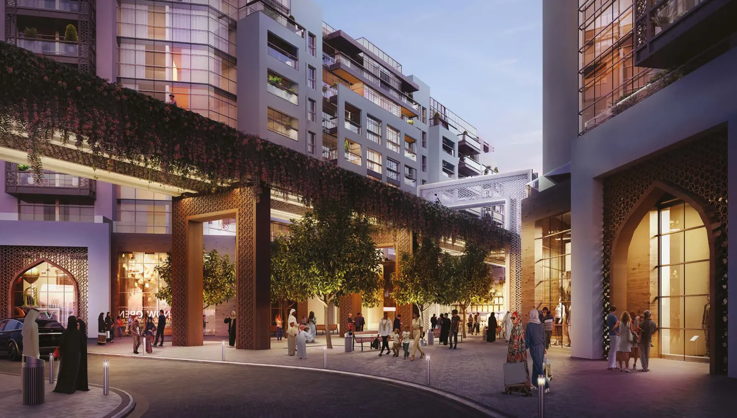 Studio apartments at The Plaza, with a lively retail street below at dusk
